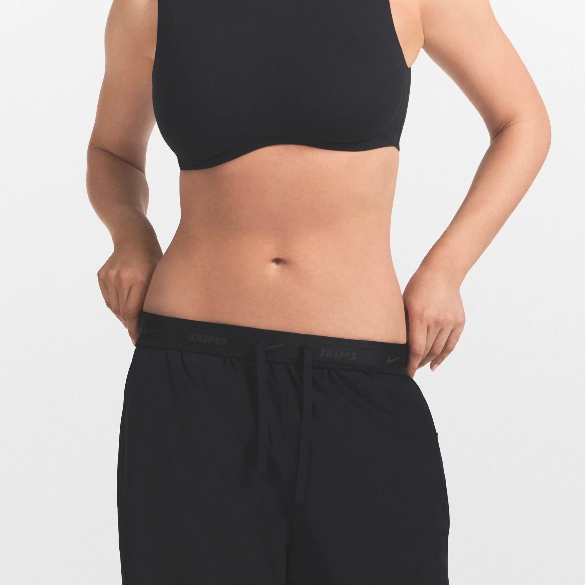 NikeSKIMS STRETCH NYLON OVERSIZED PANT | OBSIDIAN ON A MODEL VIEW