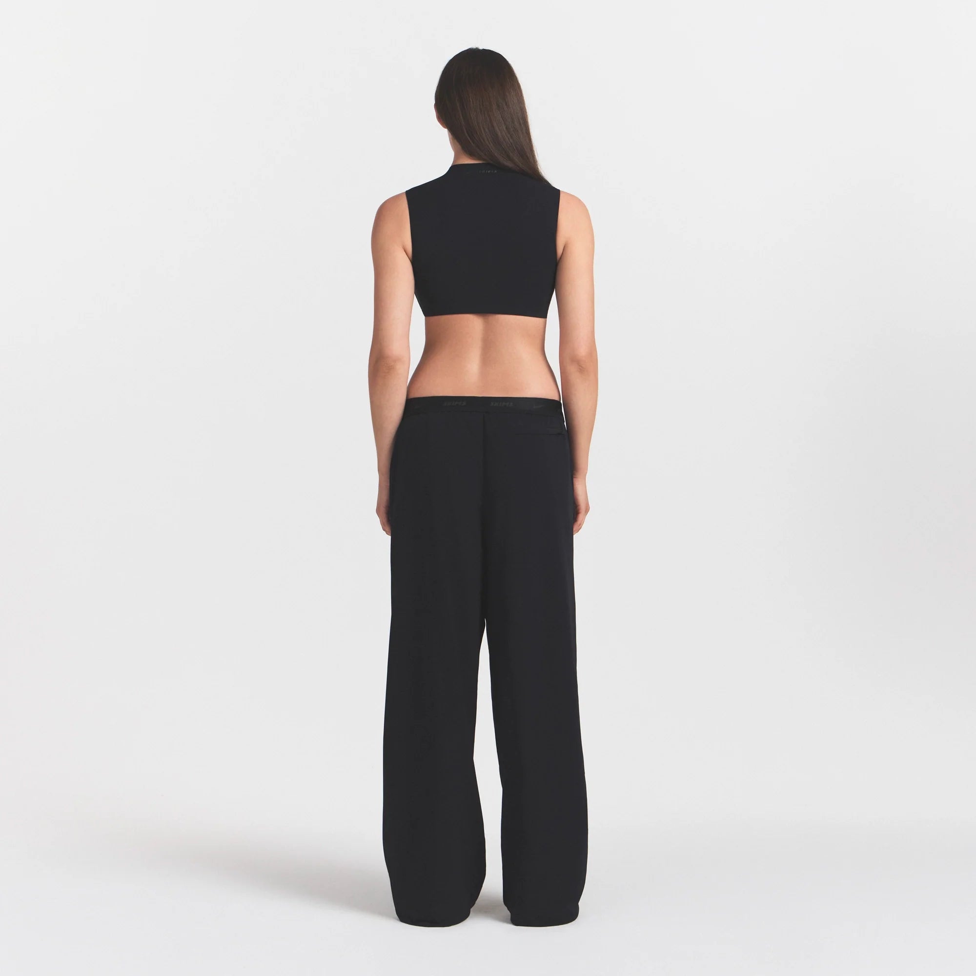 NikeSKIMS STRETCH NYLON OVERSIZED PANT | OBSIDIAN ON A MODEL VIEW @ | FOCUS: 0.0, 1.0, 0.9