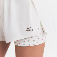 NikeSKIMS STRETCH NYLON RUNNER SHORT | IVORY ON A MODEL 