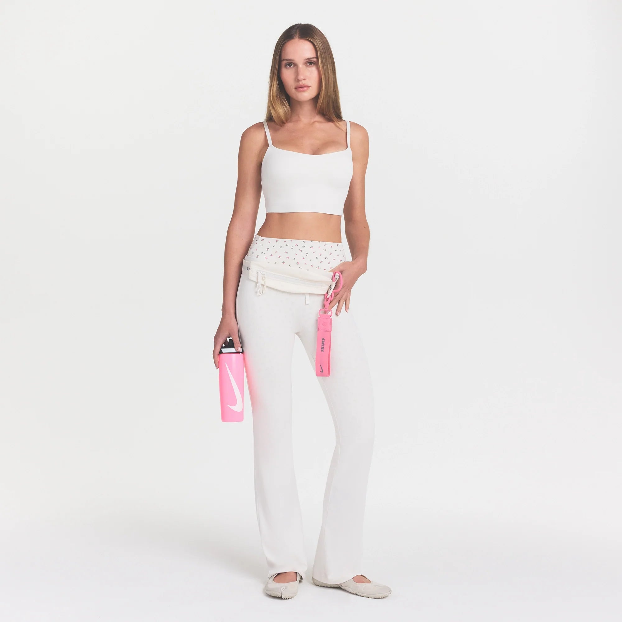 NikeSKIMS MATTE CAMI BRA TOP | IVORY ON A MODEL 