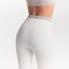 NikeSKIMS MATTE SLIM FLARE LEGGING | IVORY ON A MODEL 