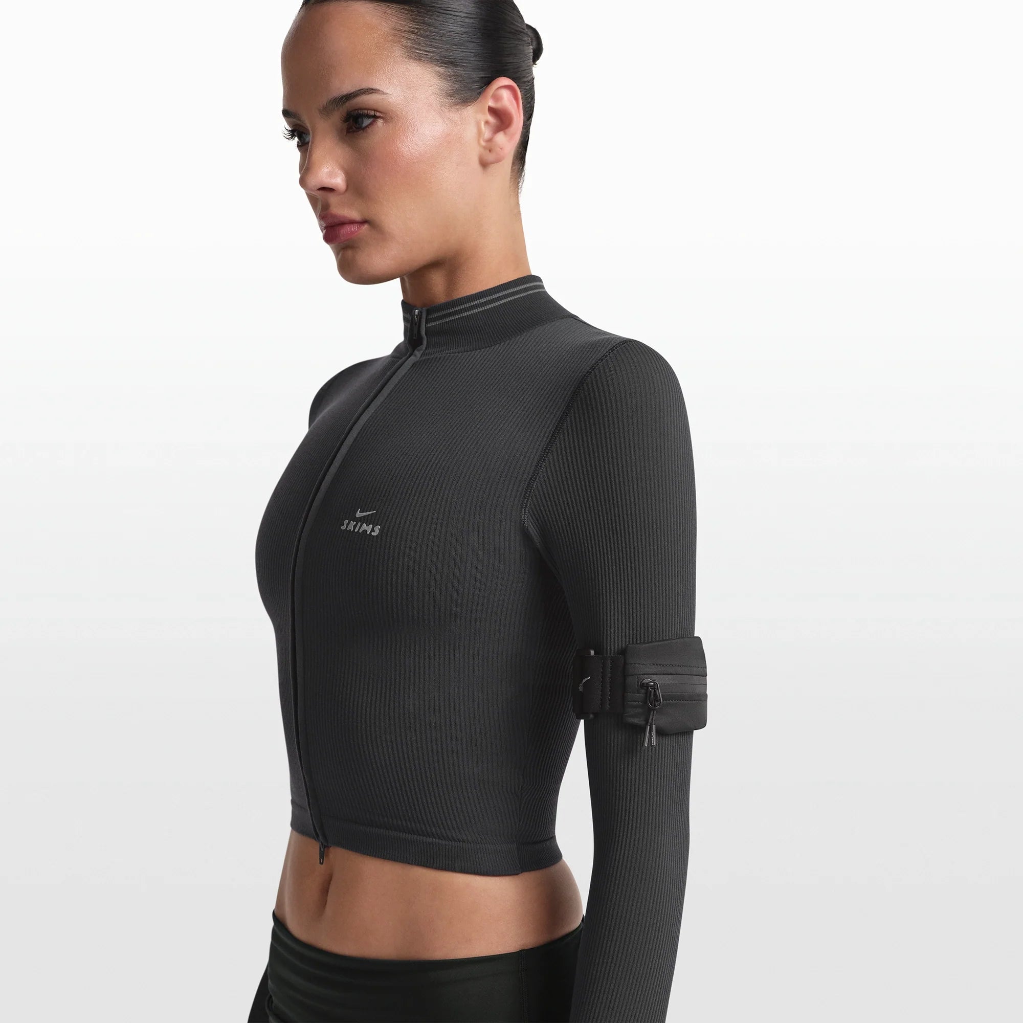 NikeSKIMS ACCESSORIES ARMBAND | OBSIDIAN & LAYS FLAT ON A WHITE BACKGROUND | FLT