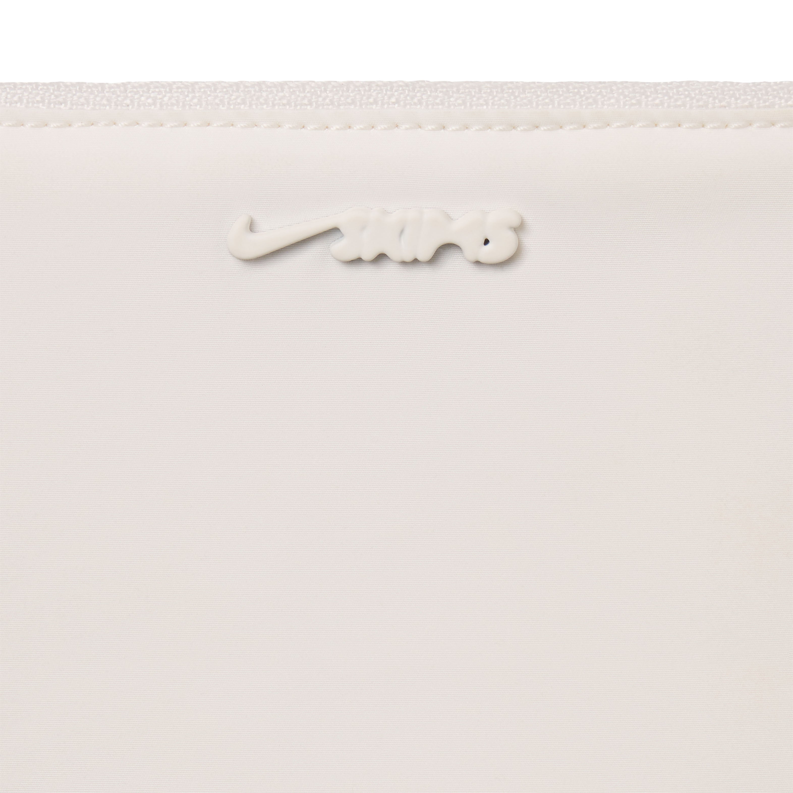 NikeSKIMS ACCESSORIES CLIPPABLE POUCH | IVORYLAYS FLAT ON A WHITE BACKGROUND