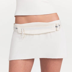 NikeSKIMS ACCESSORIES SLIM WAISTPACK | IVORYLAYS FLAT ON A WHITE BACKGROUND