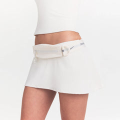 NikeSKIMS ACCESSORIES SLIM WAISTPACK | IVORYLAYS FLAT ON A WHITE BACKGROUND