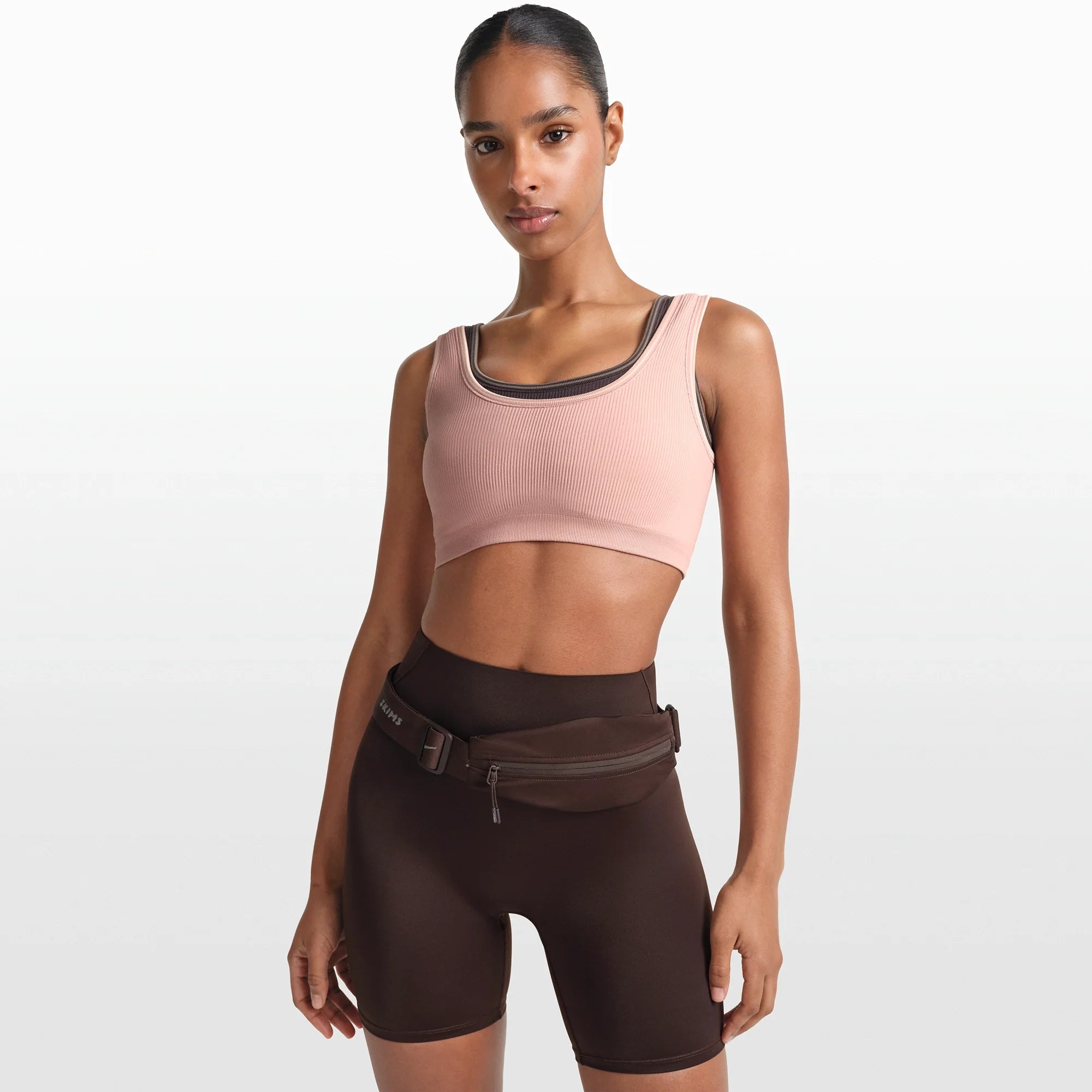 NikeSKIMS ACCESSORIES WAISTPACK | PHOENIX ON A MODEL FRONT VIEW @ | FOCUS: 0.0, 1.0, 0.9
