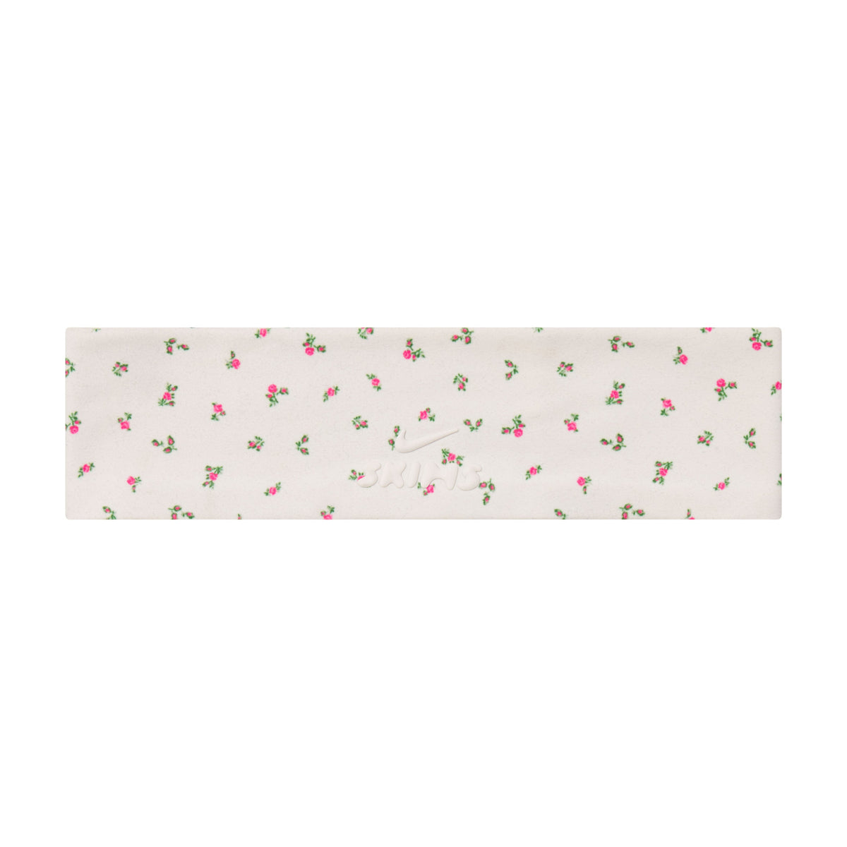 NikeSKIMS ACCESSORIES HEADBAND | DITSY FLORAL PRINT LAYS FLAT ON A WHITE BACKGROUND