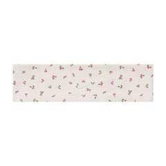 NikeSKIMS ACCESSORIES HEADBAND | DITSY FLORAL PRINT LAYS FLAT ON A WHITE BACKGROUND