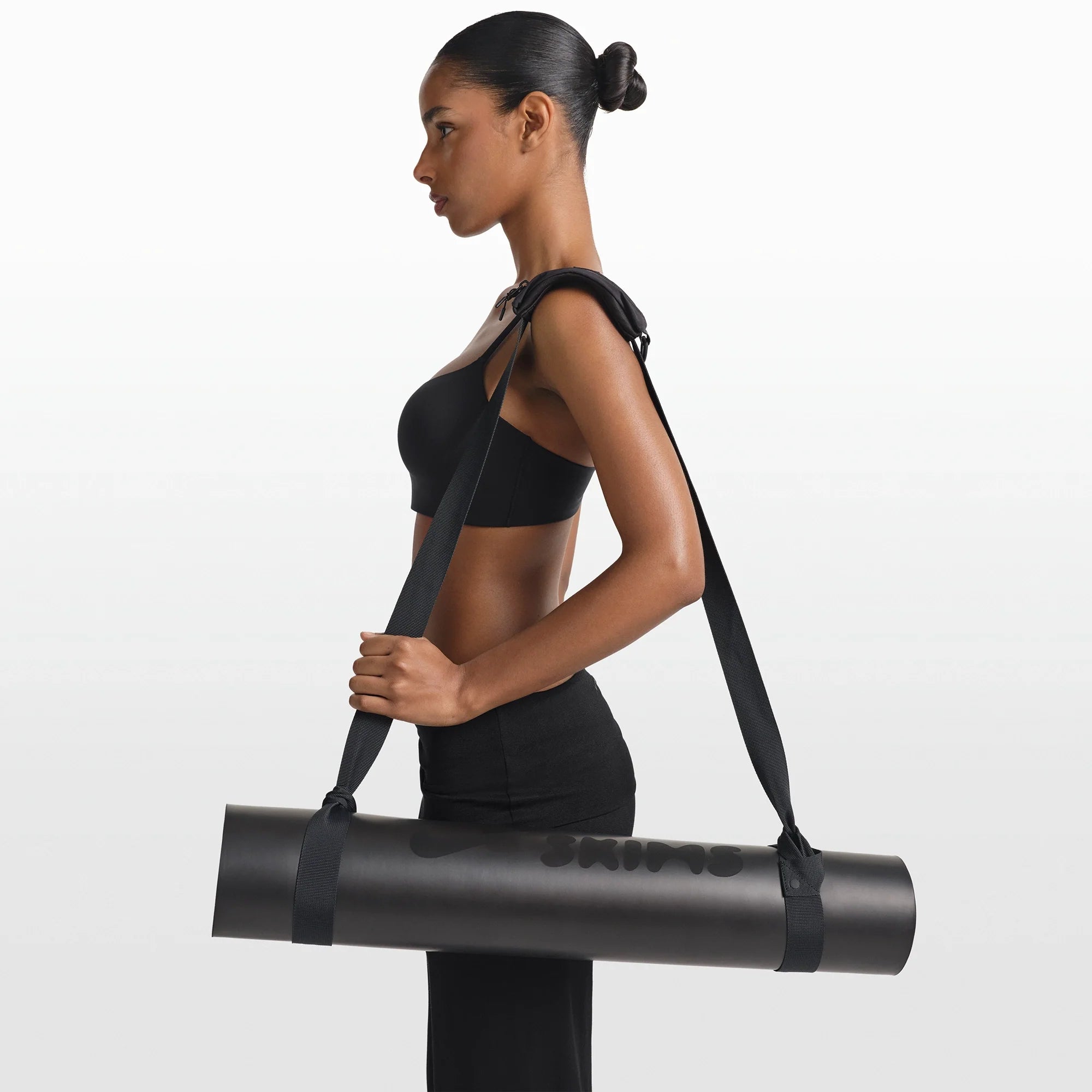 NikeSKIMS ACCESSORIES YOGA MAT STRAP | OBSIDIAN & LAYS FLAT ON A WHITE BACKGROUND | FLT