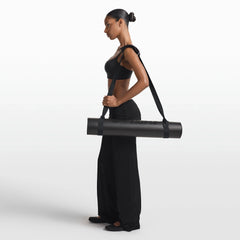 NikeSKIMS ACCESSORIES YOGA MAT STRAP | OBSIDIAN & LAYS FLAT ON A WHITE BACKGROUND | FLT