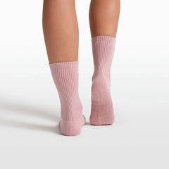 NikeSKIMS ACCESSORIES DRI-FIT PILATES GRIP CREW SOCK | HIMALAYAN FLAT ON A WHITE BACKGROUND