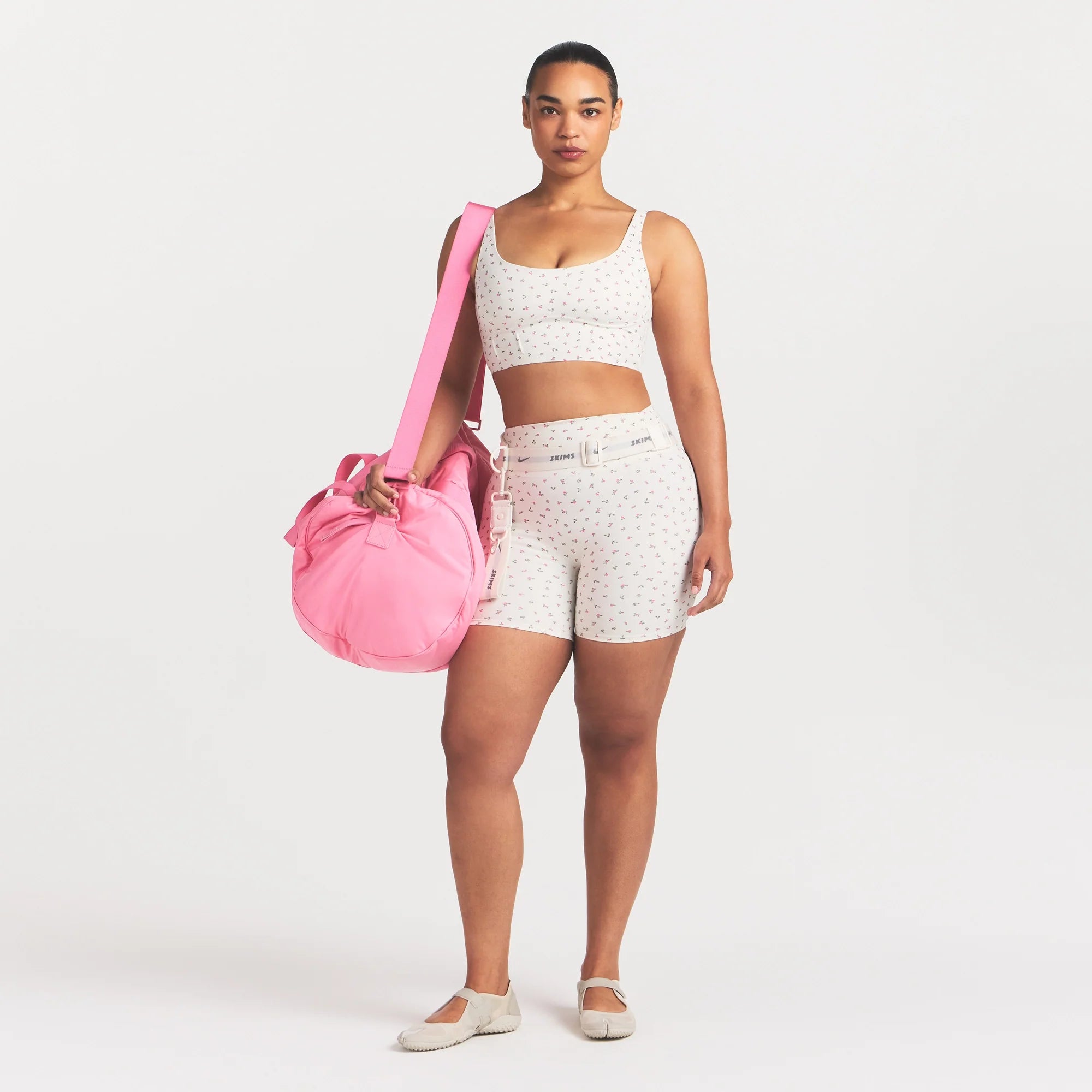 NikeSKIMS MATTE CORSET LONGLINE BRA | DITSY FLORAL PRINT ON A MODEL @ | FOCUS: 0.0, 1.0, 0.9