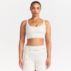 NikeSKIMS MATTE CORSET LONGLINE BRA | DITSY FLORAL PRINT ON A MODEL 