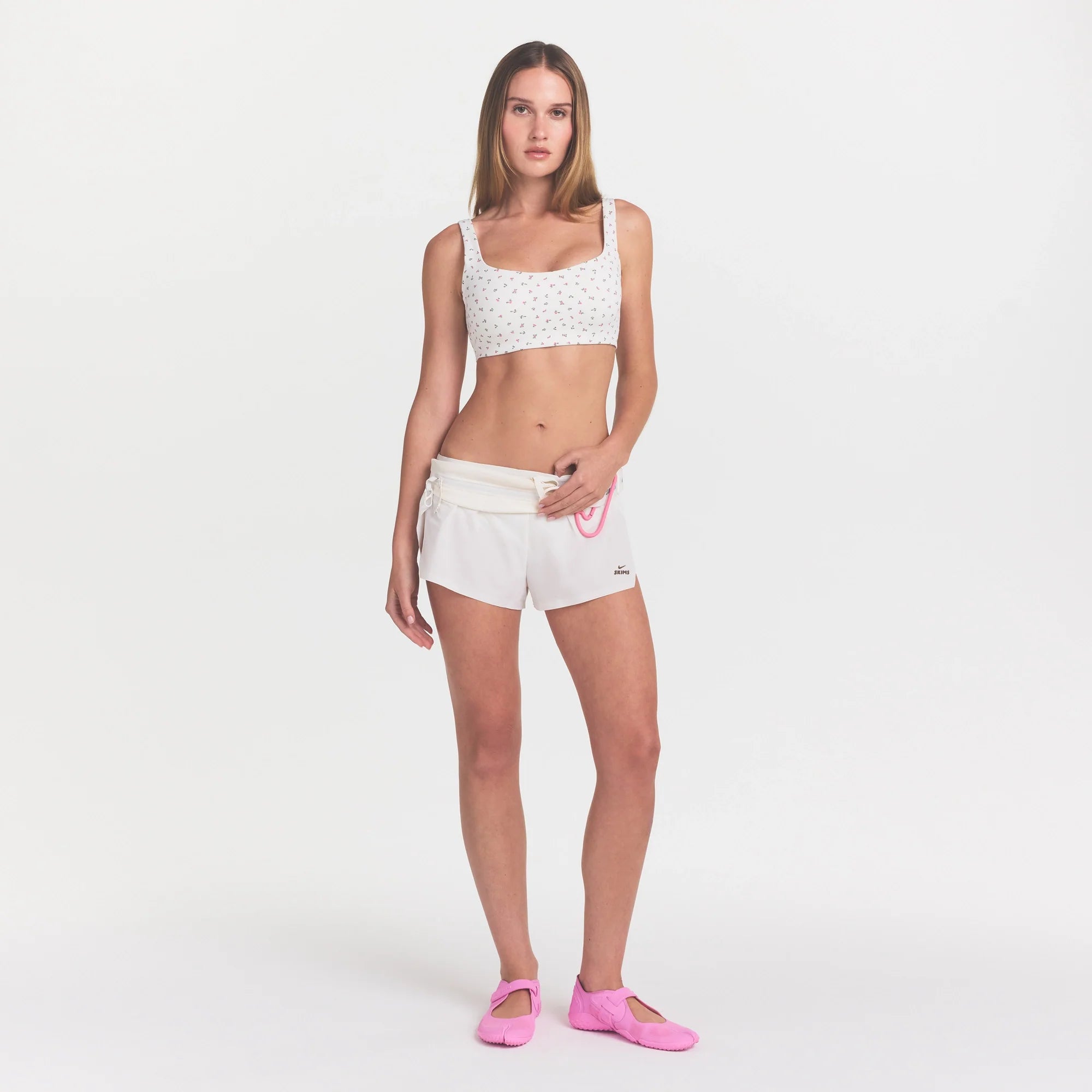 NikeSKIMS MATTE SCOOP NECK BRA | DITSY FLORAL PRINT ON A MODEL 