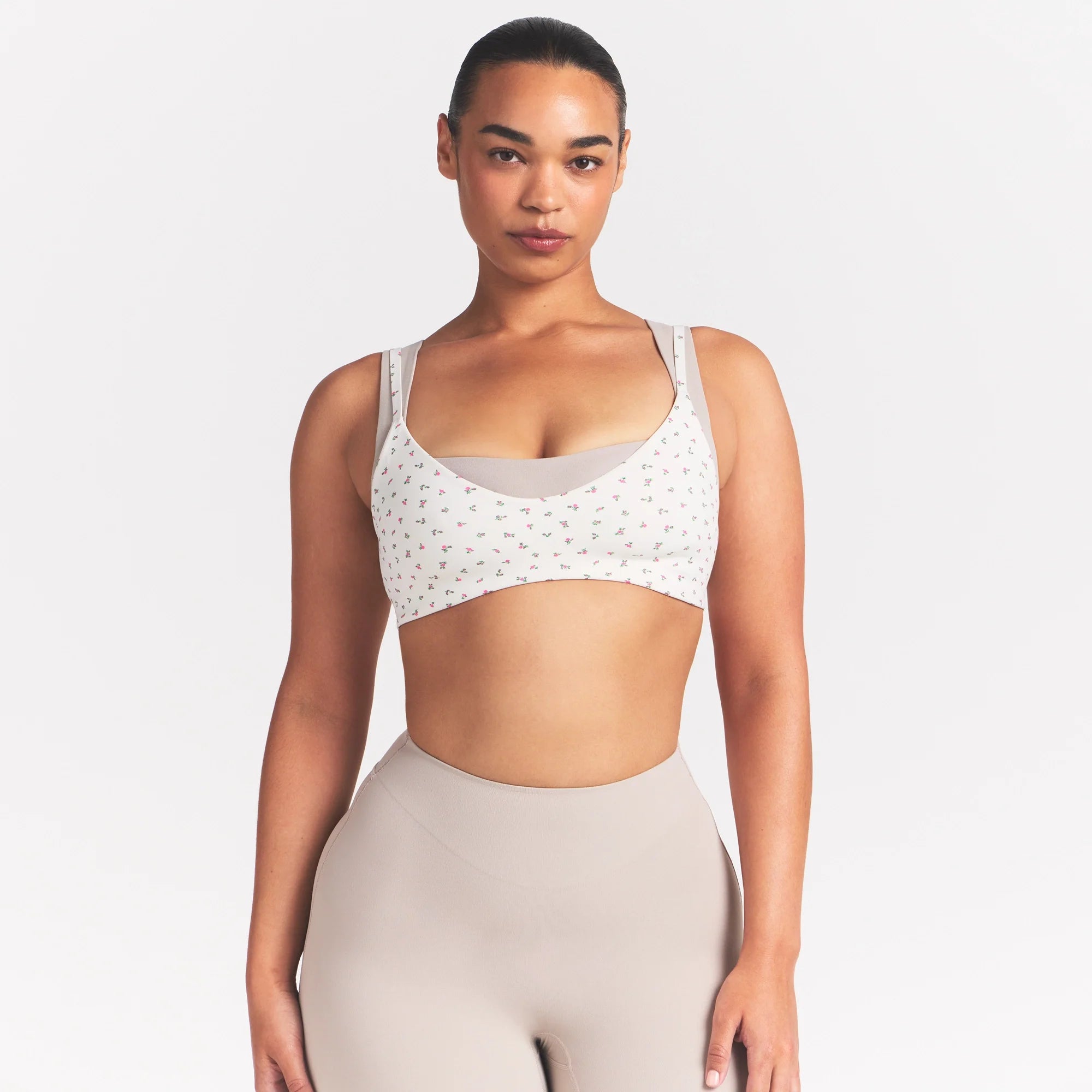 NikeSKIMS MATTE MICRO SCOOP BRA | DITSY FLORAL PRINT ON A MODEL 
