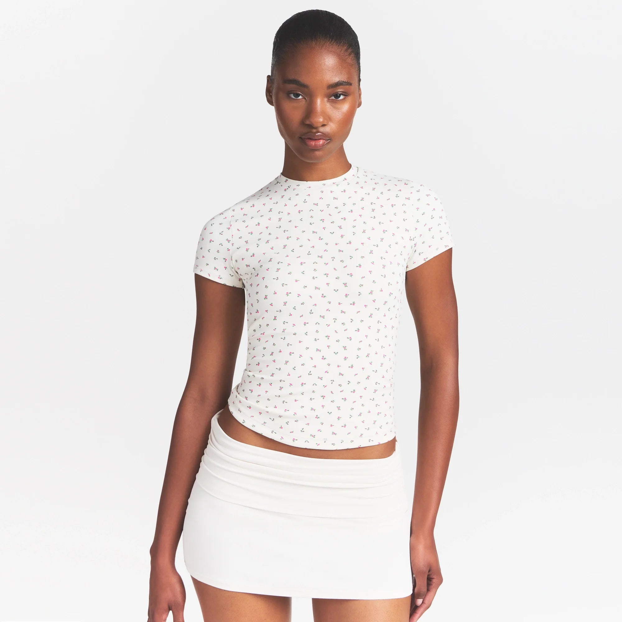 NikeSKIMS MATTE PADDED BABY TEE | DITSY FLORAL PRINT ON A MODEL 