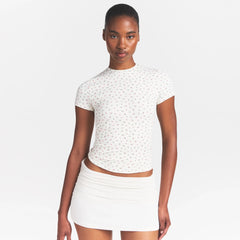 NikeSKIMS MATTE PADDED BABY TEE | DITSY FLORAL PRINT ON A MODEL 