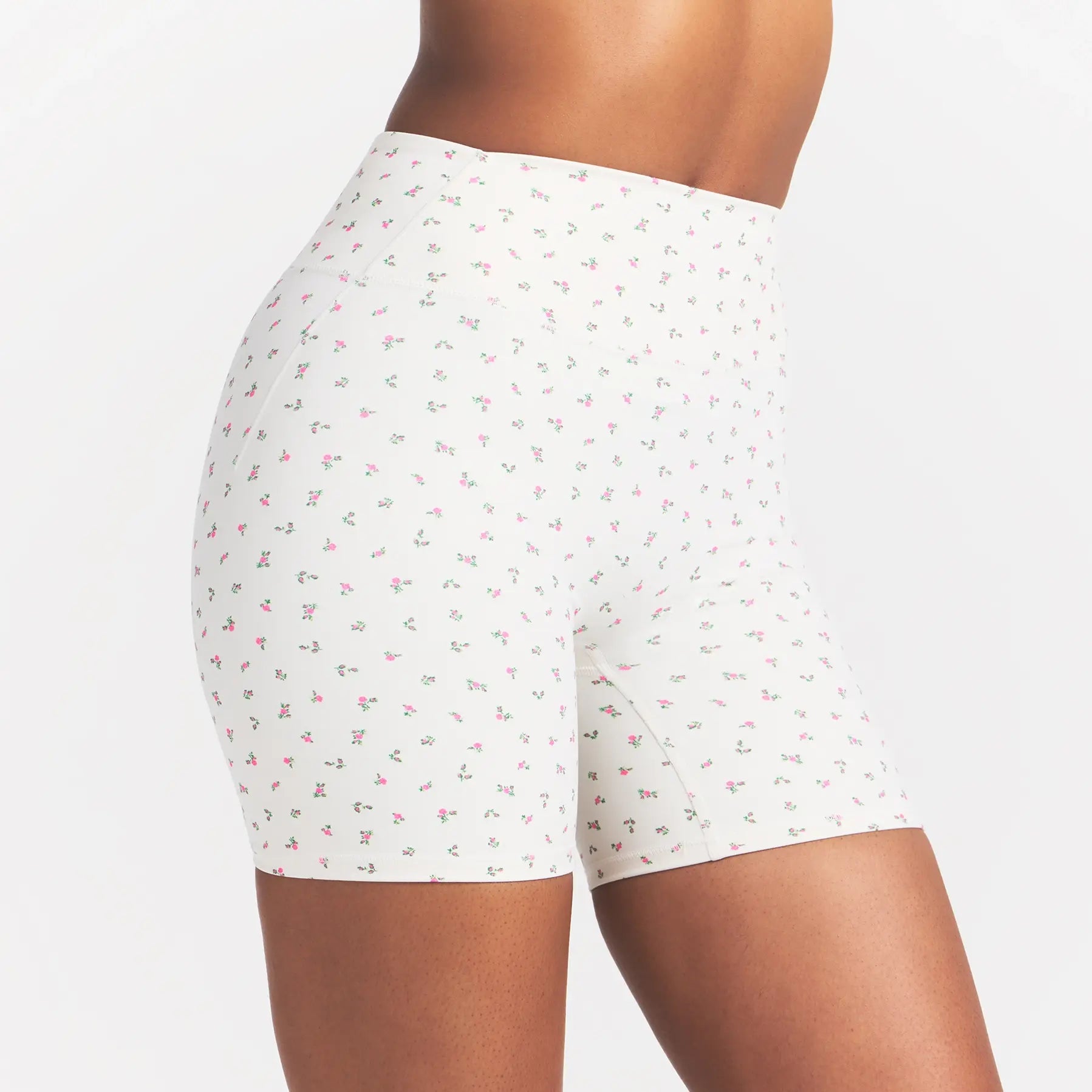 NikeSKIMS MATTE 5" BIKER SHORT | DITSY FLORAL PRINT ON A MODEL 