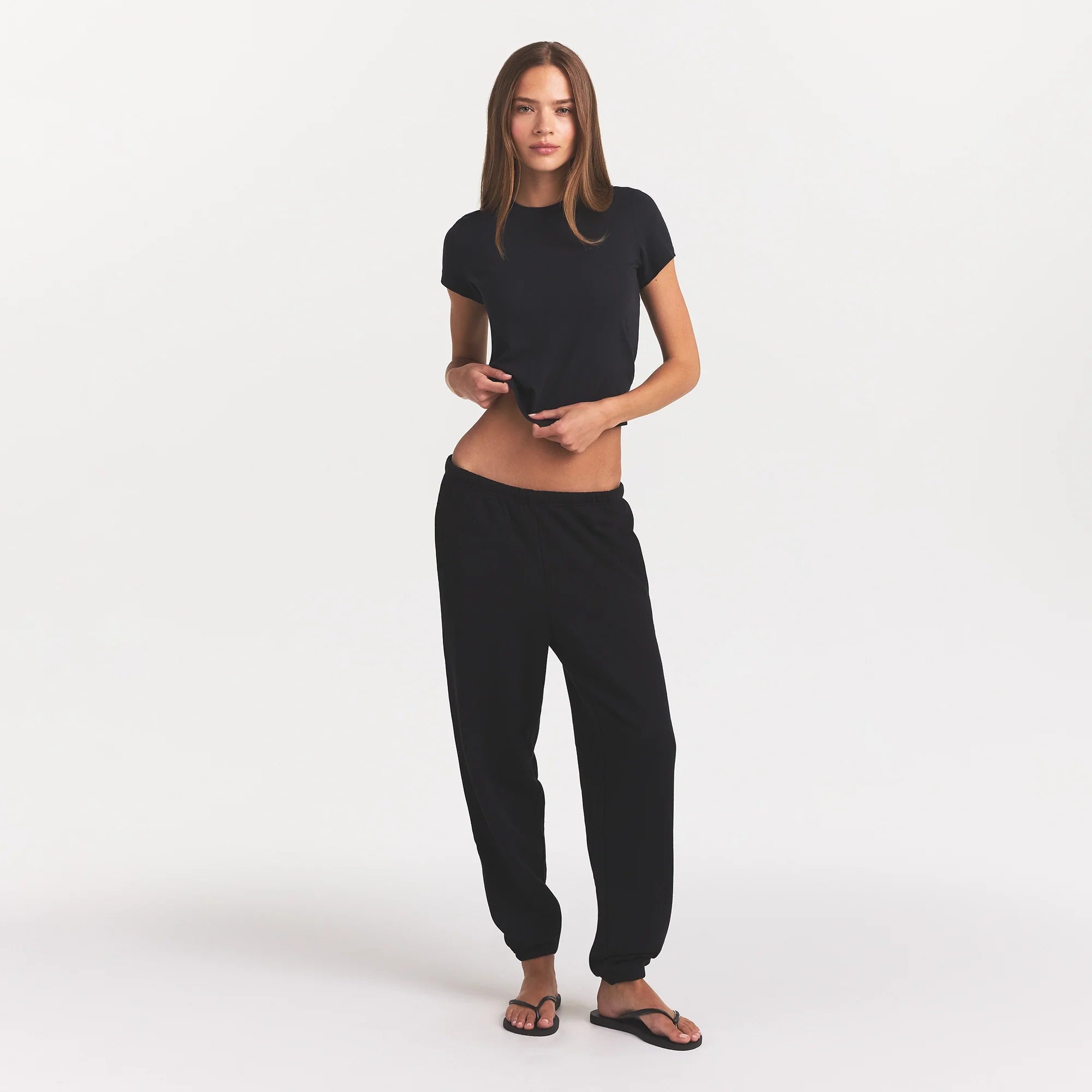 COTTON FLEECE CLASSIC JOGGER | ONYX ON A MODEL FRONT VIEW @ | FOCUS: 0.0, 1.0, 0.9