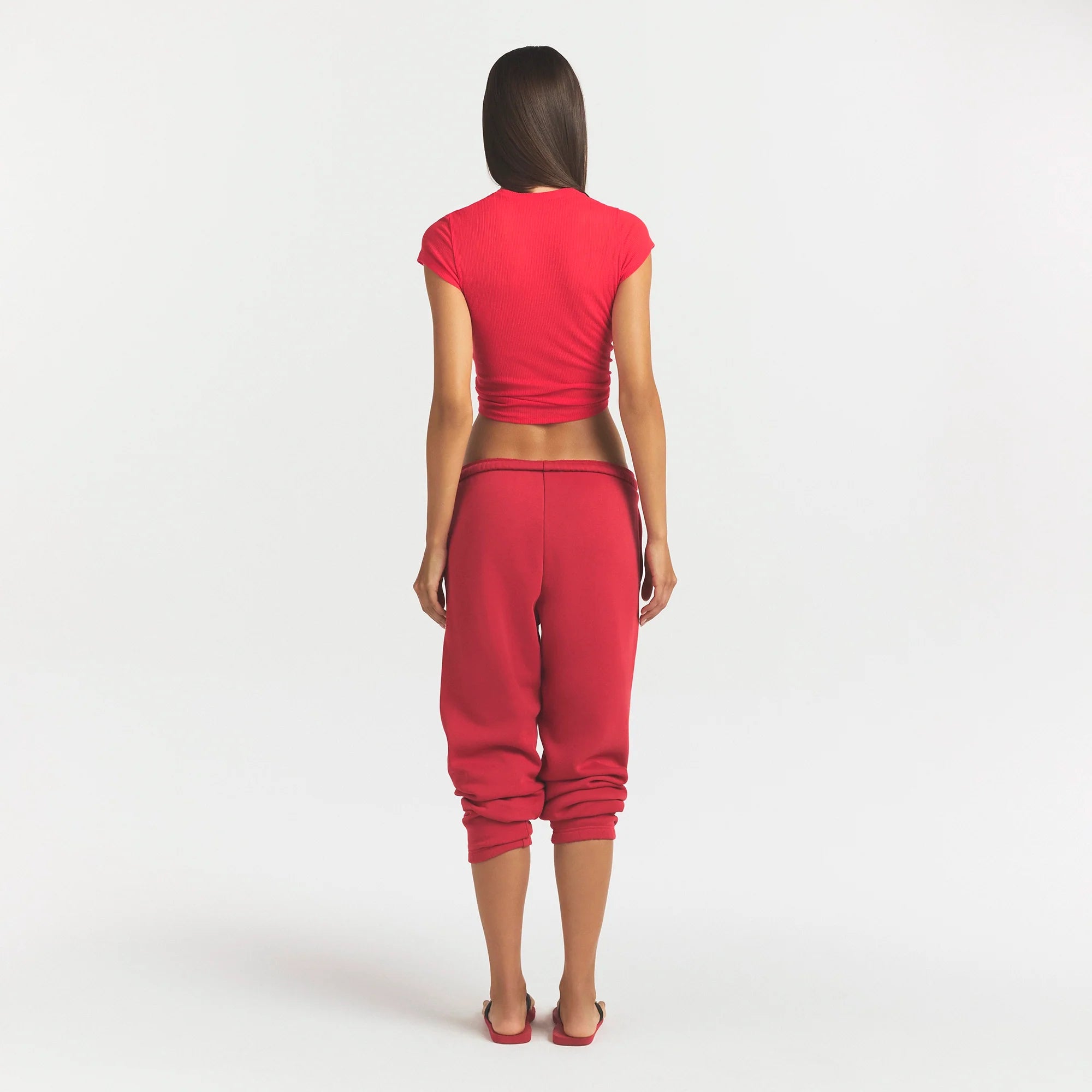 COTTON FLEECE CLASSIC JOGGER | WASHED RED ON A MODEL SIDE VIEW @ | FOCUS: 0.0, 1.0, 0.9