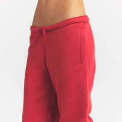 COTTON FLEECE CLASSIC JOGGER | WASHED RED ON A MODEL SIDE VIEW @ | FOCUS: 0.0, 1.0, 0.9
