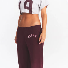 COTTON FLEECE CLASSIC JOGGER | CURRANT ARCHED SKIMS PLAID ON A MODEL SIDE VIEW @ | FOCUS: 0.0, 1.0, 0.9
