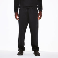 FLEECE LOUNGE MENS RELAXED JOGGER | WASHED ONYX ON A MODEL SIDE VIEW @ | FOCUS: 0.0, 1.0, 0.9