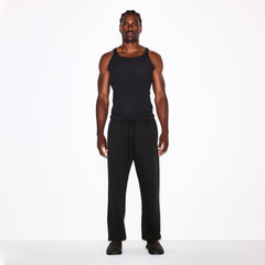 FLEECE LOUNGE MENS RELAXED JOGGER | WASHED ONYX ON A MODEL FRONT VIEW @ | FOCUS: 0.0, 1.0, 0.9