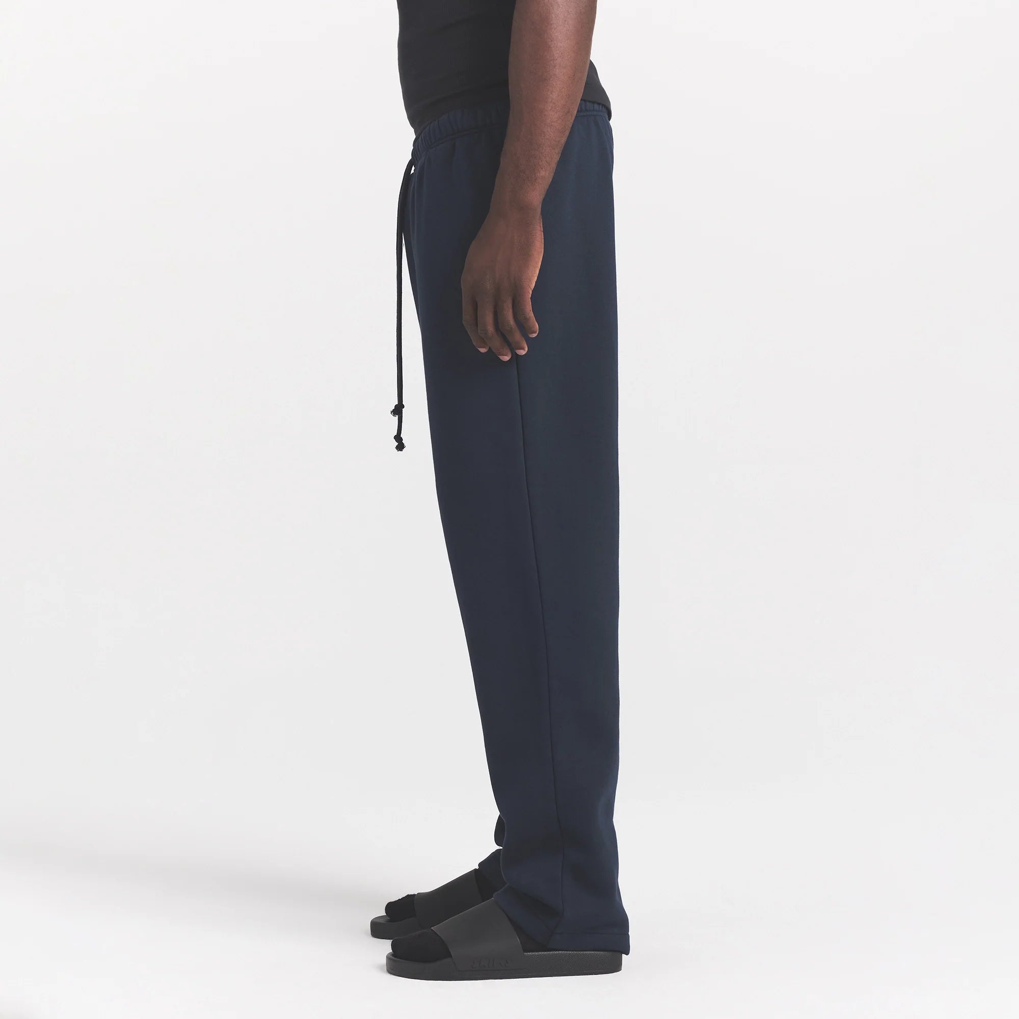 FLEECE LOUNGE MENS CLASSIC STRAIGHT LEG PANT | NAVY ON A MODEL SIDE VIEW @ | FOCUS: 0.0, 1.0, 0.9