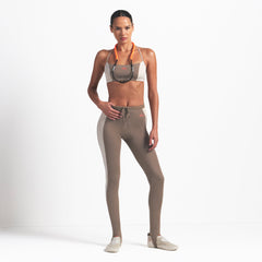 NikeSKIMS SHINE DRAWCORD STIRRUP 26" LEGGING | TRUFFLE AND STONE ON A MODEL FRONT VIEW @ | FOCUS: 0.0, 1.0, 0.9