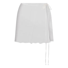 SKIMS ROMANCE TIE SIDE MINI SKIRT | IVORY LAYS FLAT ON A WHITE BACKGROUND | FLT 