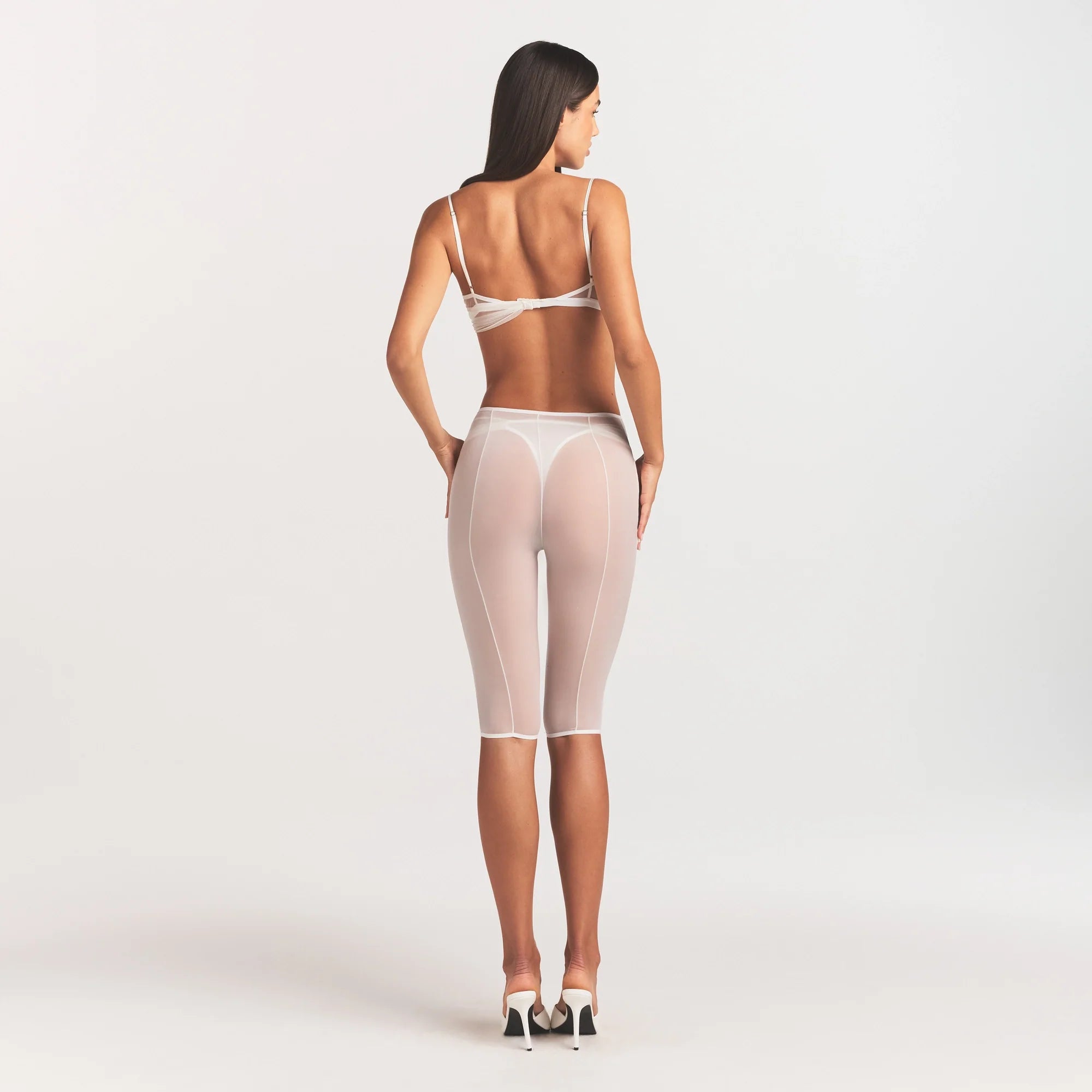 ULTRA FINE MESH DRAPED CAPRI | IVORY ON A MODEL FRONT VIEW @ | FOCUS: 0.0, 1.0, 0.9