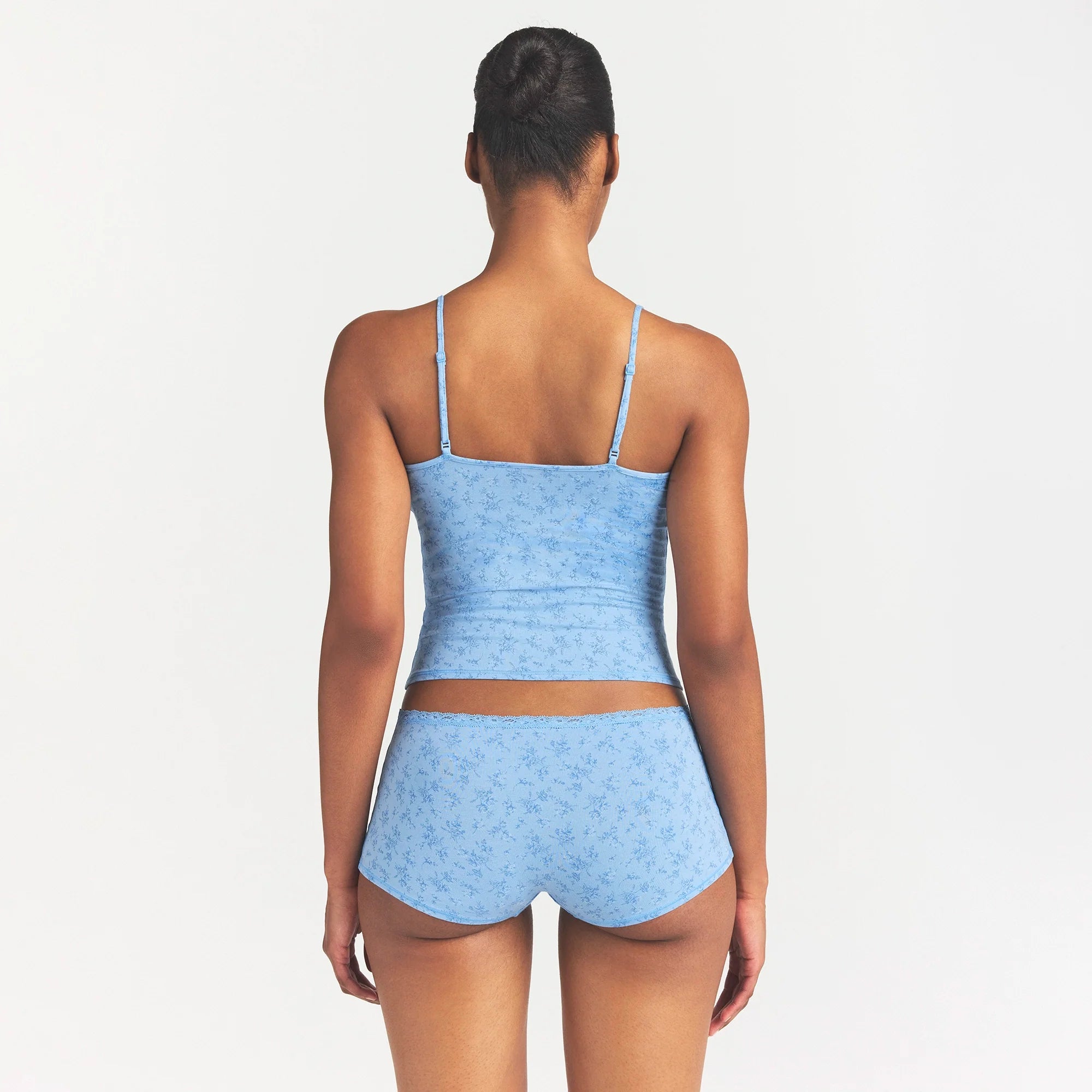 LIGHTWEIGHT COTTON LACE CAMI AND BOY SHORT SET | SURF DAINTY FLORAL PRINT ON A MODEL SIDE VIEW @ | FOCUS: 0.0, 1.0, 0.9
