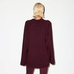 NikeSKIMS AIRY V-NECK OVERSIZED LONG SLEEVE TOP | CURRANT ON A MODEL BACK VIEW @ | FOCUS: 0.0, 1.0, 0.9
