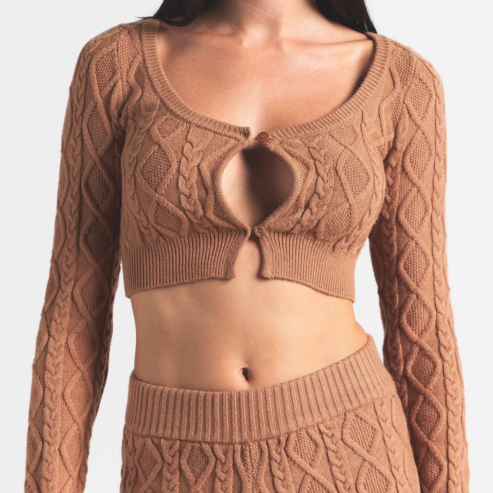 SWEATER KNIT CROPPED CARDIGAN | DARK HONEY ON A MODEL FRONT VIEW @ | FOCUS: 0.0, 1.0, 0.9