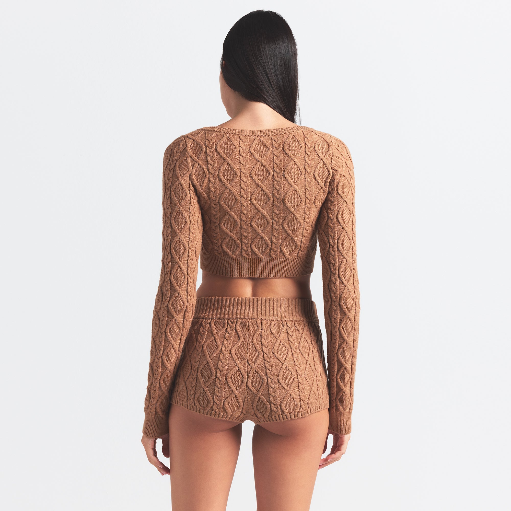 SWEATER KNIT CROPPED CARDIGAN | DARK HONEY ON A MODEL BACK VIEW @ | FOCUS: 0.0, 1.0, 0.9