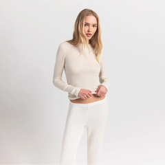 FEATHERWEIGHT CASHMERE LONG SLEEVE TOP | EGRET ON A MODEL SIDE VIEW @ | FOCUS: 0.0, 1.0, 0.9
