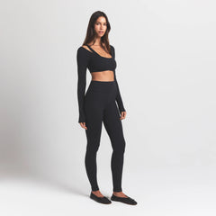 WOOL RIB LONG SLEEVE SUPER CROPPED TOP | OBSIDIAN ON A MODEL SIDE VIEW S | FOCUS: 0.0, 1.0, 0.9