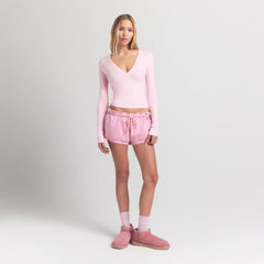 COTTON JERSEY LONG SLEEVE DEEP PLUNGE TOP | CHERRY BLOSSOM ON A MODEL FRONT VIEW S | FOCUS: 0.0, 1.0, 0.9