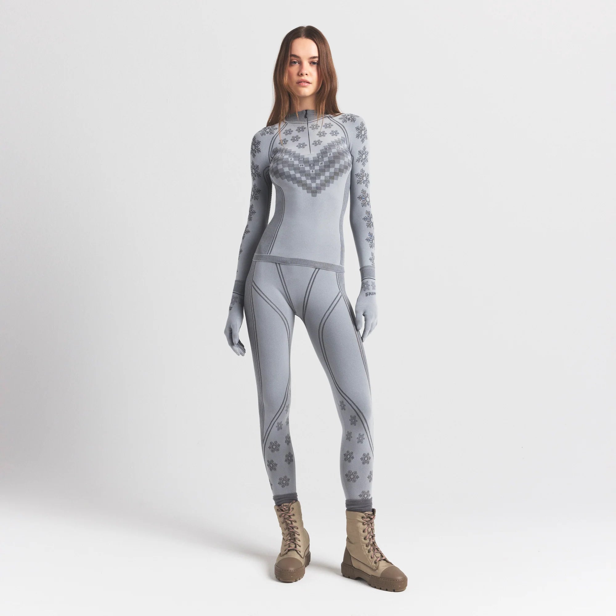 SKIMS FIRST LAYERS HALF ZIP LONG SLEEVE | MIRROR WINTER FAIR ISLE ON A MODEL FRONT VIEW @ | FOCUS: 0.0, 1.0, 0.9