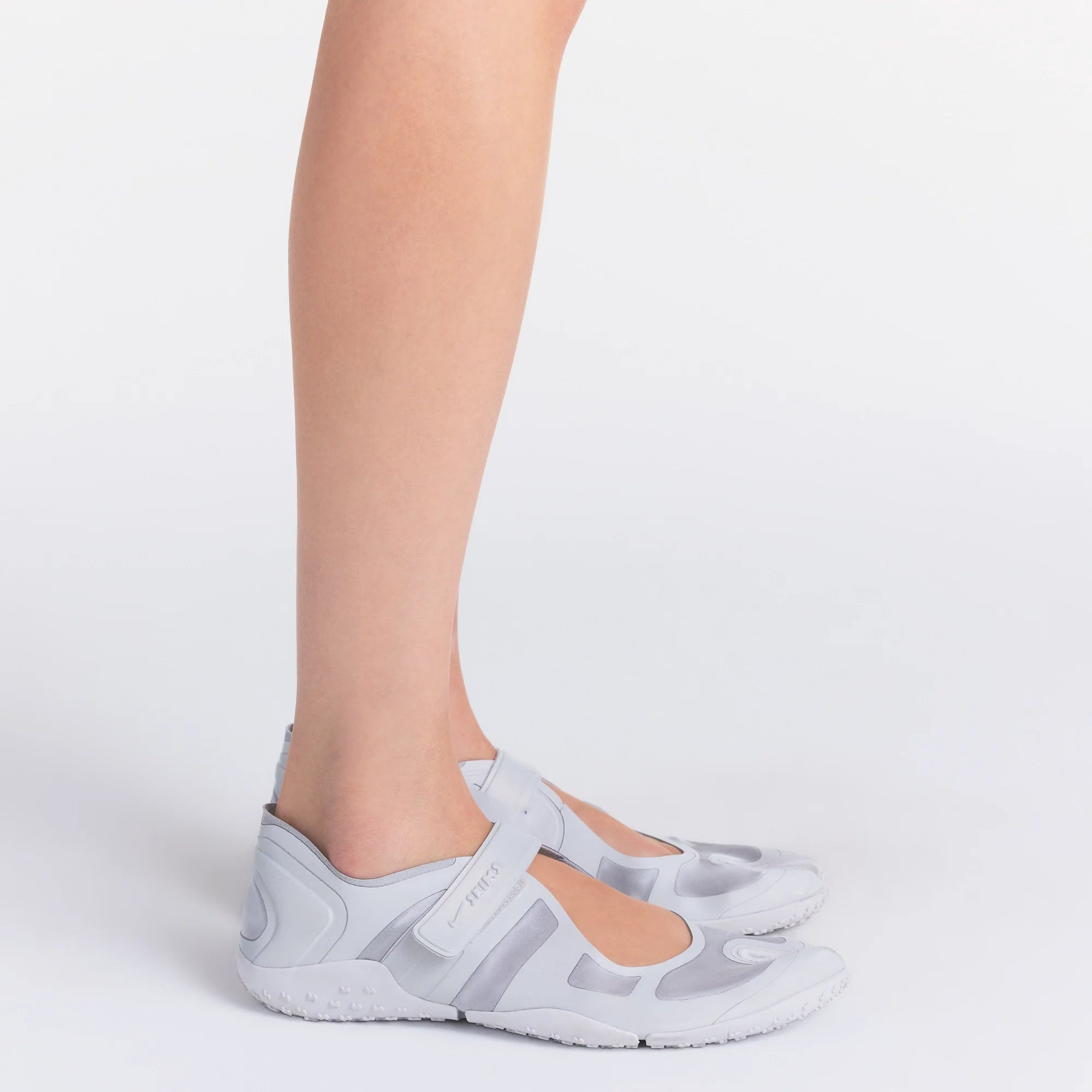 NikeSKIMS FOOTWEAR RIFT SATIN | SILVER ON A MODEL SIDE VIEW| FOCUS: 0.0, 1.0, 0.9 