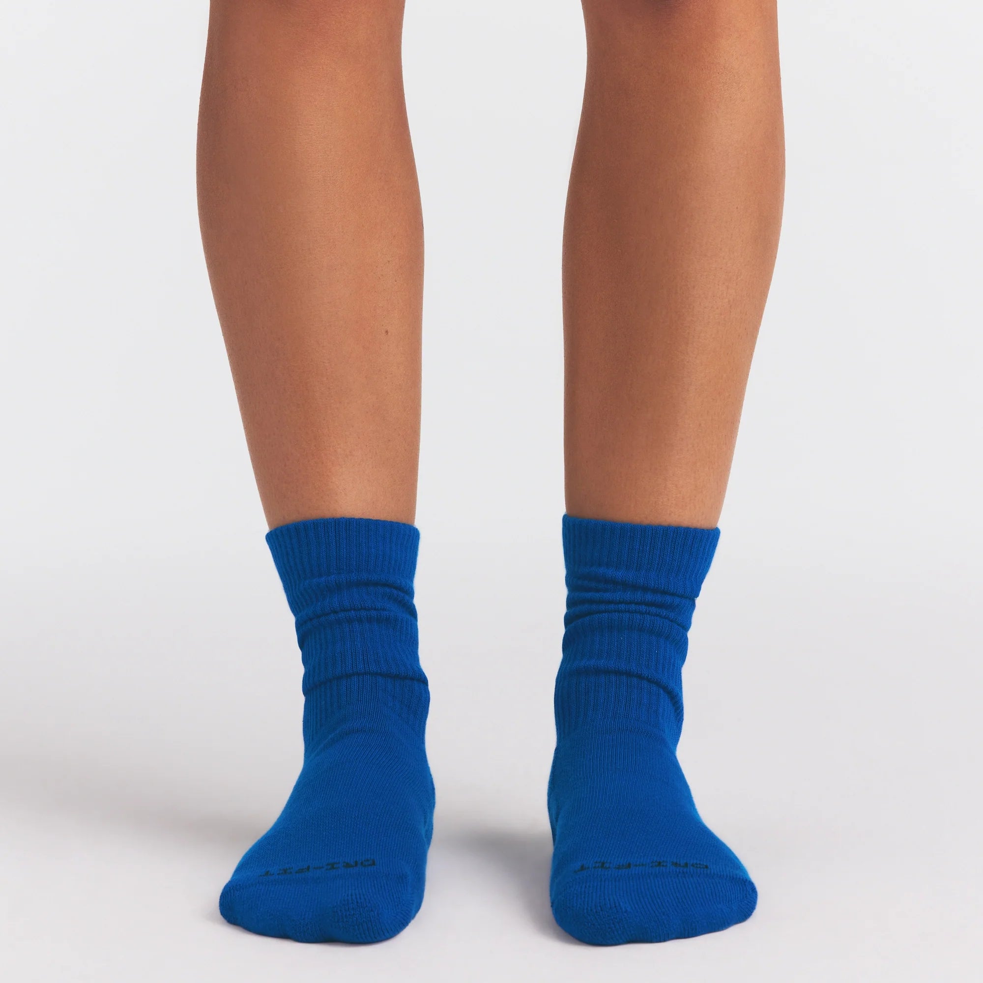 NikeSKIMS ACCESSORIES DRI-FIT™ CREW SOCK 3-PACK | COBALT MULTI ON A MODEL SIDE VIEW @ | FOCUS: 0.0, 1.0, 0.9