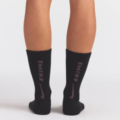 NikeSKIMS ACCESSORIES DRI-FIT™ CREW SOCK 3-PACK | COBALT MULTI ON A MODEL SIDE VIEW @ | FOCUS: 0.0, 1.0, 0.9