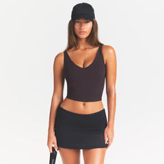 NikeSKIMS ACCESSORIES CLUB CAP | OBSIDIAN ON A MODEL SIDE VIEW @ | FOCUS: 0.0, 1.0, 0.9