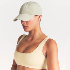 NikeSKIMS ACCESSORIES CLUB CAP | TALC ON A MODEL SIDE VIEW @ | FOCUS: 0.0, 1.0, 0.9