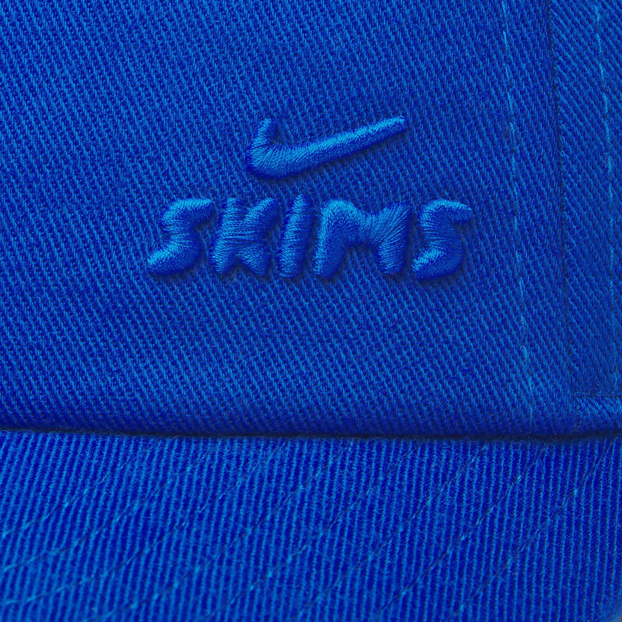 NikeSKIMS ACCESSORIES CLUB CAP | COBALT FLAT ON A WHITE BACKGROUND
