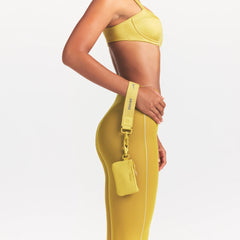 NikeSKIMS ACCESSORIES CLIPPABLE POUCH | CITRINE FRONT FACE @ | FOCUS: 0.0, 1.0, 0.9