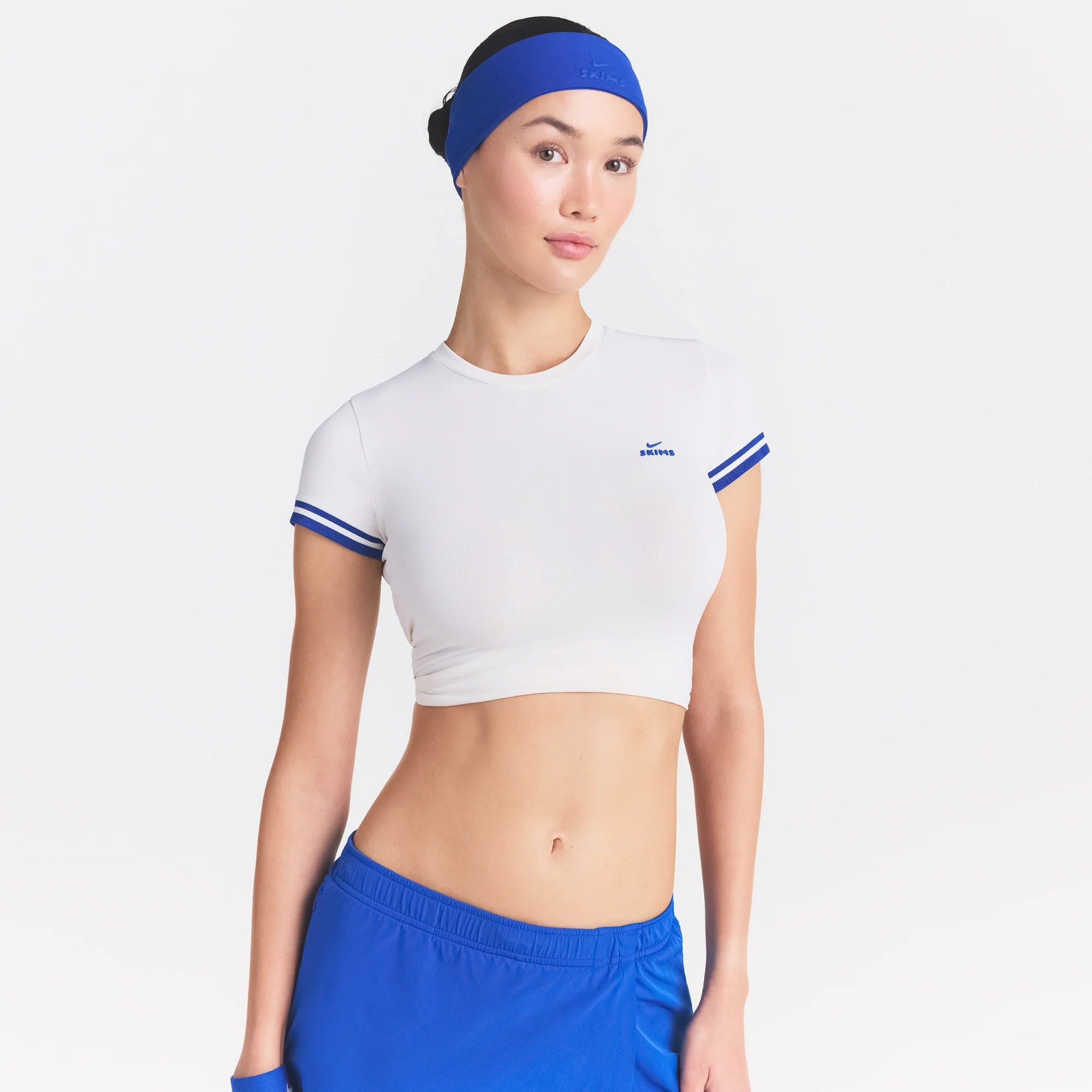 NikeSKIMS ACCESSORIES HEADBAND | COBALT ON A MODEL SIDE VIEW @ | FOCUS: 0.0, 1.0, 0.9
