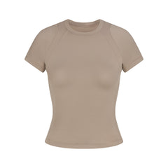 NikeSKIMS AIRY DRI-FIT BABY T-SHIRT | DRIFTWOOD FLAT ON A WHITE BACKGROUND | FLT