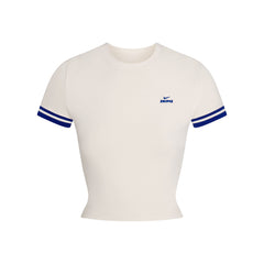 NikeSKIMS STRETCH KNIT CROP BABY T-SHIRT | NSKM ACTV IVORY/NSKM COBALT FLAT ON A WHITE BACKGROUND | FLT